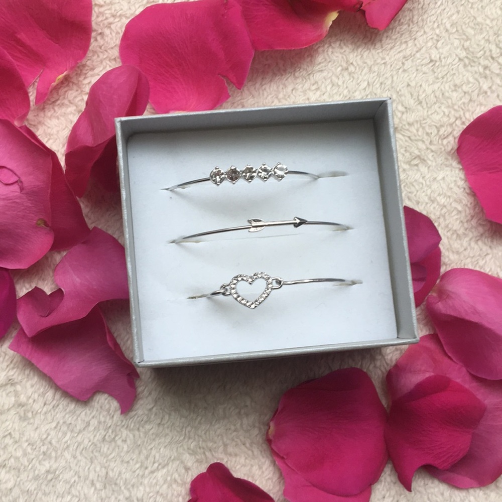 Three silver bracelets